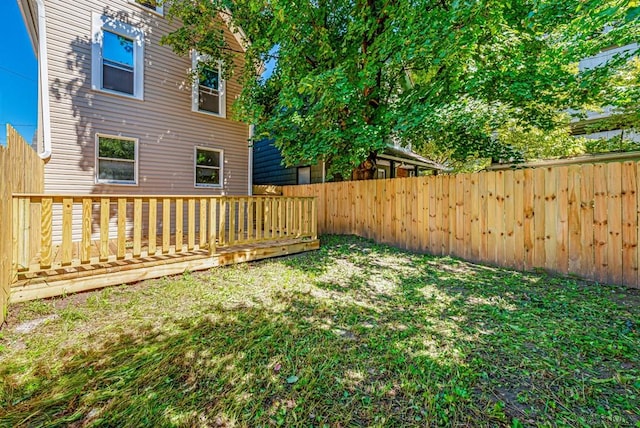 view of yard featuring a wooden deck