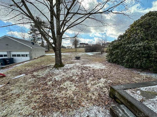 view of yard with a garage