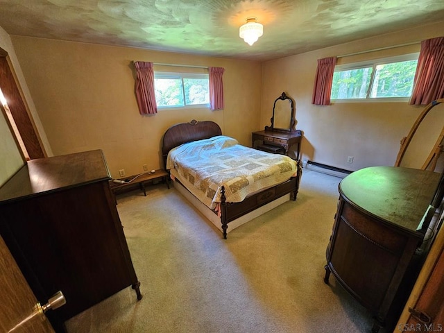 1827 Saylor School Rd, Boswell, PA 15531 - bedroom featuring a baseboard heating unit and light carpet