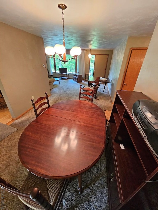 1827 Saylor School Rd, Boswell, PA 15531 - dining room featuring light carpet and a chandelier