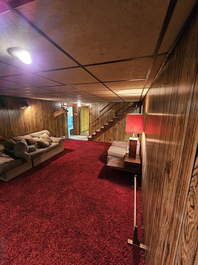 1827 Saylor School Rd, Boswell, PA 15531 - carpeted living area with wood walls and stairs