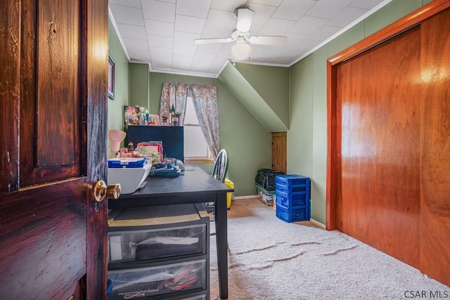 office with a ceiling fan, carpet flooring, baseboards, and ornamental molding