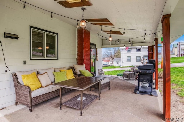 view of patio featuring an outdoor living space and grilling area
