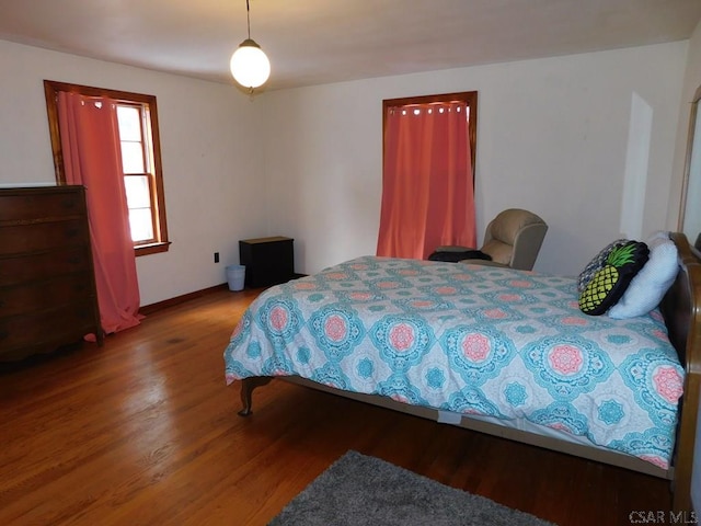 bedroom featuring wood-type flooring