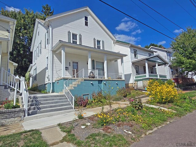 view of front of property featuring covered porch