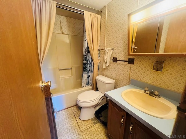 full bathroom with vanity, toilet, and shower / bath combo with shower curtain