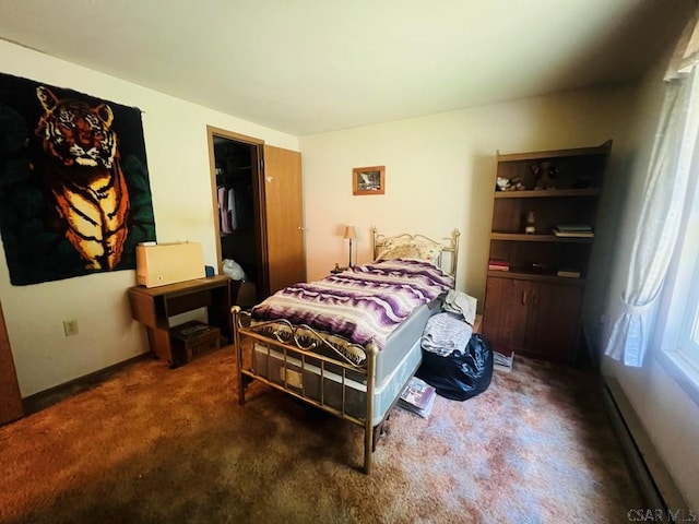 bedroom featuring a baseboard radiator and carpet flooring