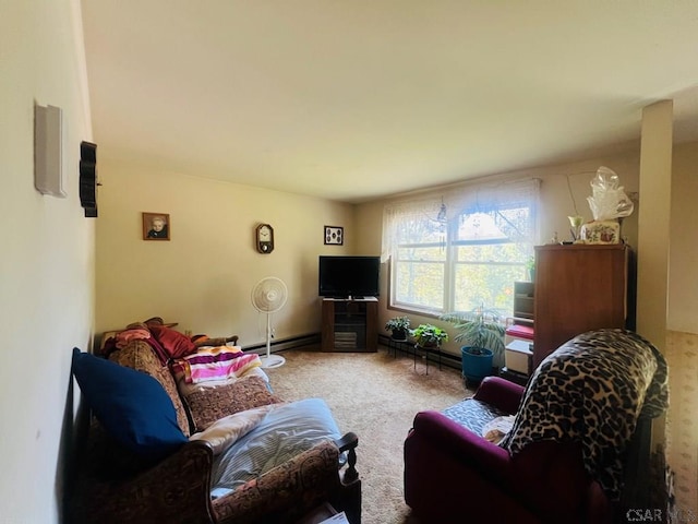 living room with a baseboard radiator and carpet