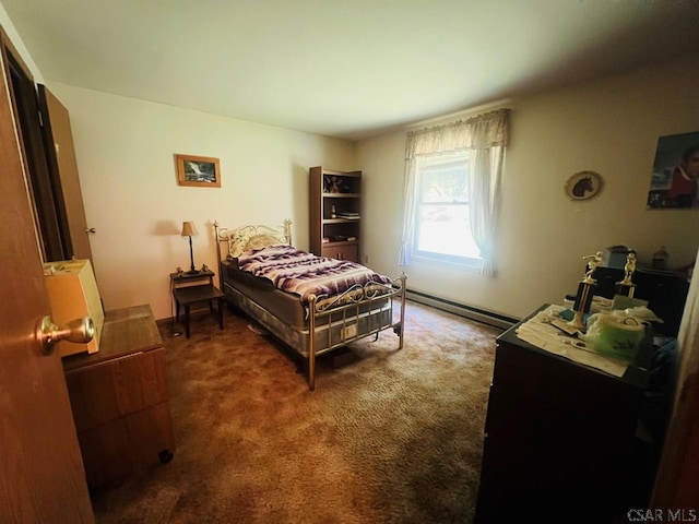 carpeted bedroom with a baseboard heating unit