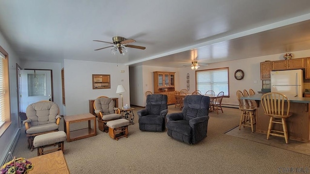 287 School Ave, Jerome, PA 15937 - living area with carpet floors, a ceiling fan, and a baseboard heating unit