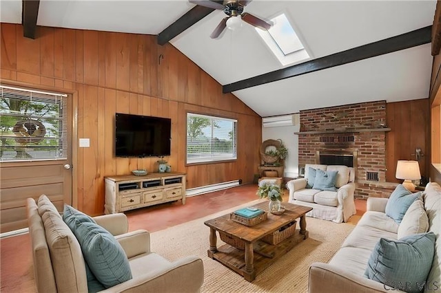 112 Ottawa Ln, Central City, PA 15926 - living area featuring a baseboard radiator, wooden walls, a skylight, a ceiling fan, and a fireplace