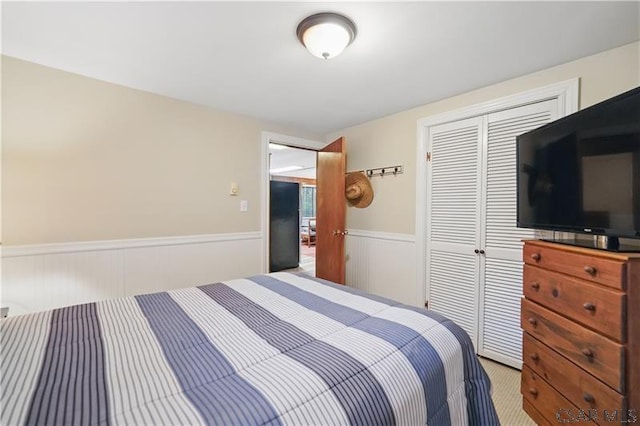 112 Ottawa Ln, Central City, PA 15926 - bedroom featuring a wainscoted wall and a closet