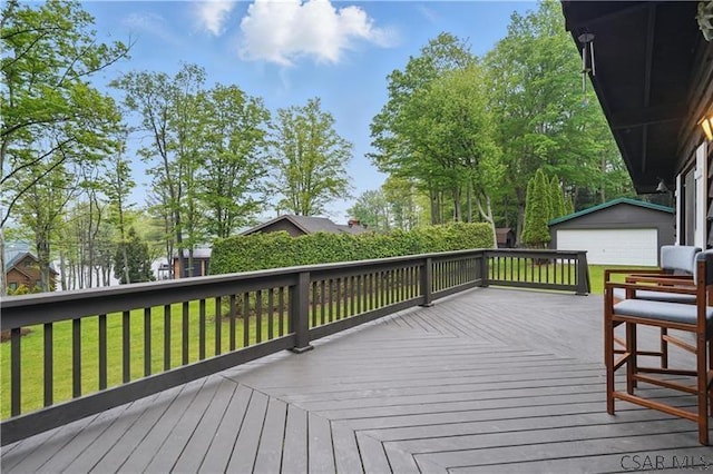 112 Ottawa Ln, Central City, PA 15926 - deck with an outbuilding, a lawn, and a detached garage