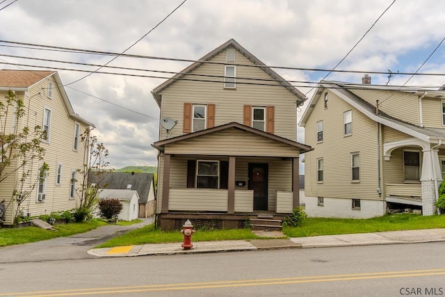 1461 Franklin St, Johnstown, PA 15905 - american foursquare style home featuring a porch