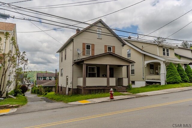 1461 Franklin St, Johnstown, PA 15905 - view of front of property featuring a porch and a chimney