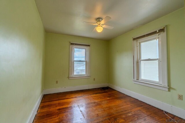 1461 Franklin St, Johnstown, PA 15905 - empty room with plenty of natural light, hardwood / wood-style floors, and baseboards