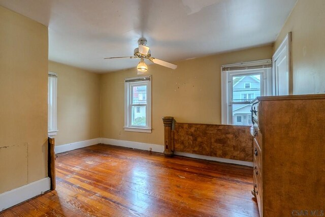 1461 Franklin St, Johnstown, PA 15905 - unfurnished room with plenty of natural light, hardwood / wood-style floors, baseboards, and a ceiling fan