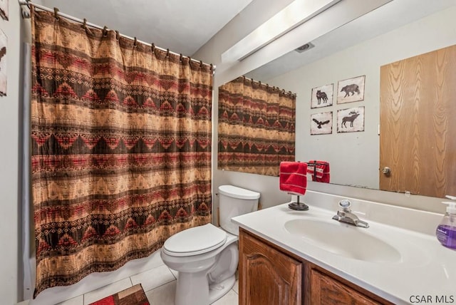 bathroom featuring a shower with shower curtain, tile patterned flooring, toilet, and vanity