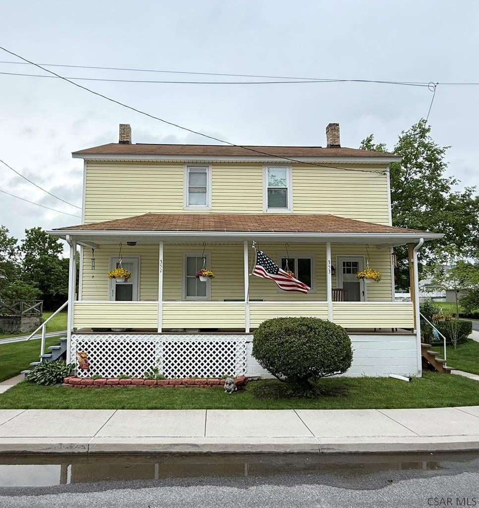 351 Third St, Saint Michael, PA 15951 - view of front of property with a chimney, covered porch, and a front yard