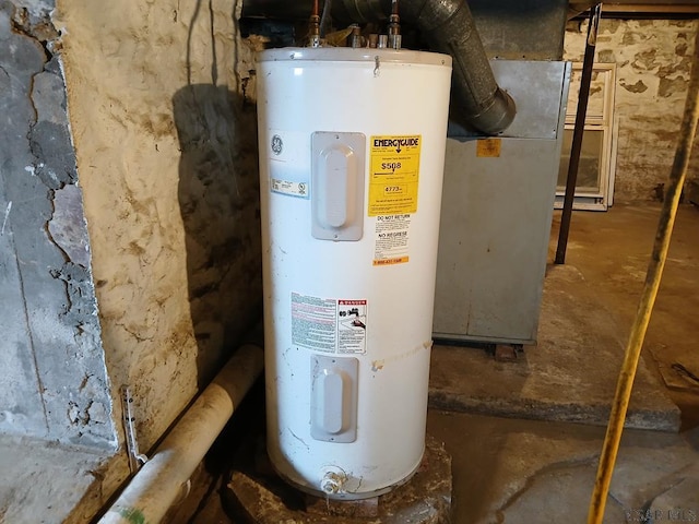 utility room with water heater