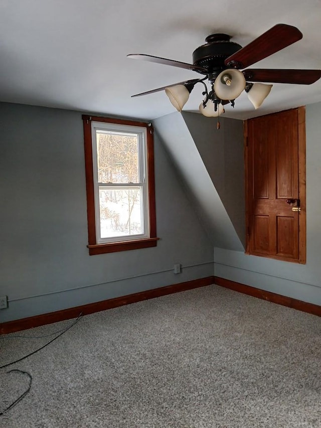 bonus room featuring vaulted ceiling and ceiling fan