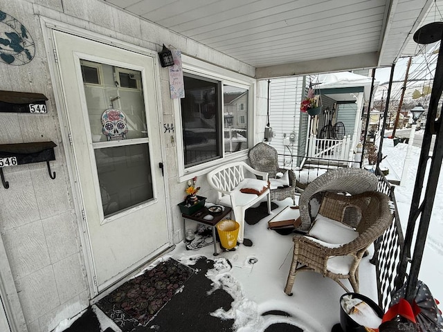 view of snow covered patio