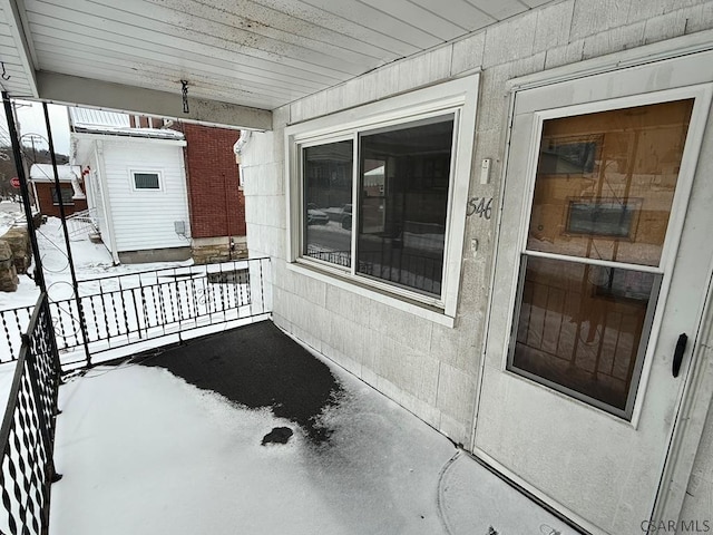 view of snow covered patio