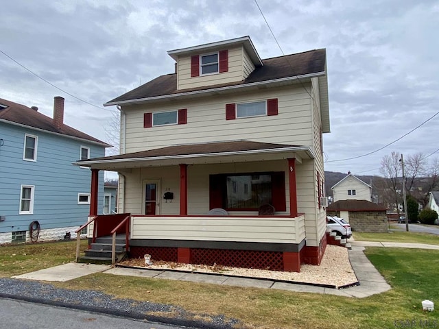 view of front of property featuring covered porch