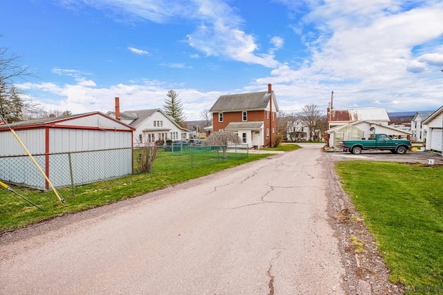 view of road with a residential view