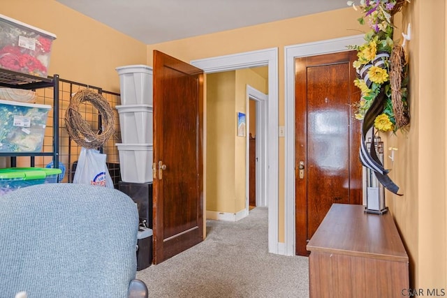 carpeted bedroom with baseboards