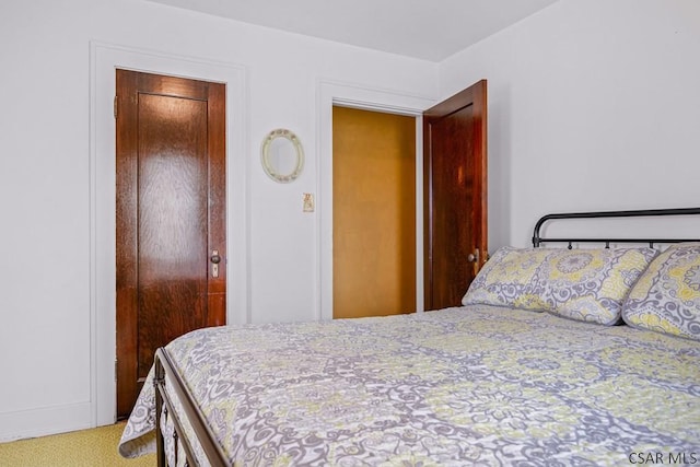 bedroom with light carpet
