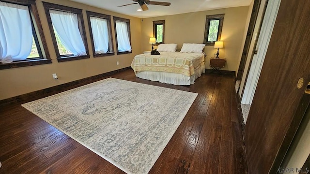 909 Snake Rd, Ebensburg, PA 15931 - bedroom featuring dark wood-style floors, baseboards, and ceiling fan