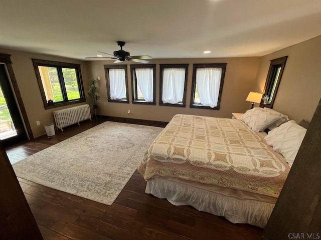 909 Snake Rd, Ebensburg, PA 15931 - bedroom with radiator heating unit, wood-type flooring, recessed lighting, access to exterior, and ceiling fan