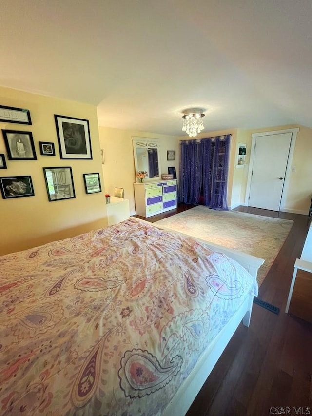 909 Snake Rd, Ebensburg, PA 15931 - bedroom featuring a chandelier and wood finished floors