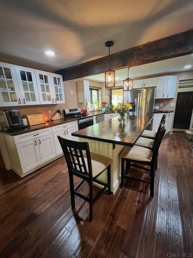 909 Snake Rd, Ebensburg, PA 15931 - dining room with dark wood-style floors, beamed ceiling, and recessed lighting