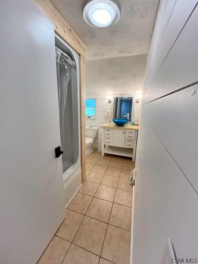 909 Snake Rd, Ebensburg, PA 15931 - full bath with toilet, tile patterned flooring, vanity, and shower / bathtub combination with curtain