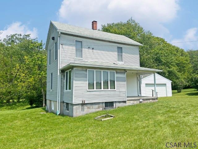 1310 Krayn Rd, Windber, PA 15963 - back of property featuring a chimney and a yard