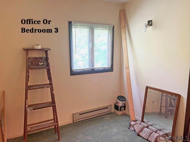 1310 Krayn Rd, Windber, PA 15963 - unfurnished bedroom featuring a baseboard radiator and carpet