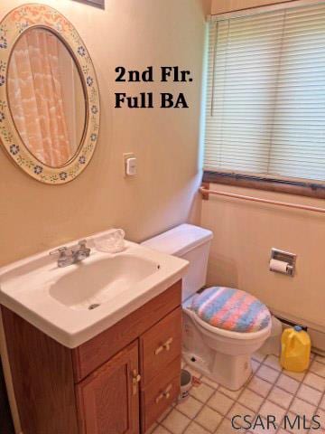 1310 Krayn Rd, Windber, PA 15963 - bathroom featuring vanity, toilet, and tile patterned floors