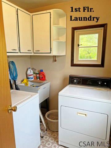 1310 Krayn Rd, Windber, PA 15963 - washroom featuring cabinet space and separate washer and dryer