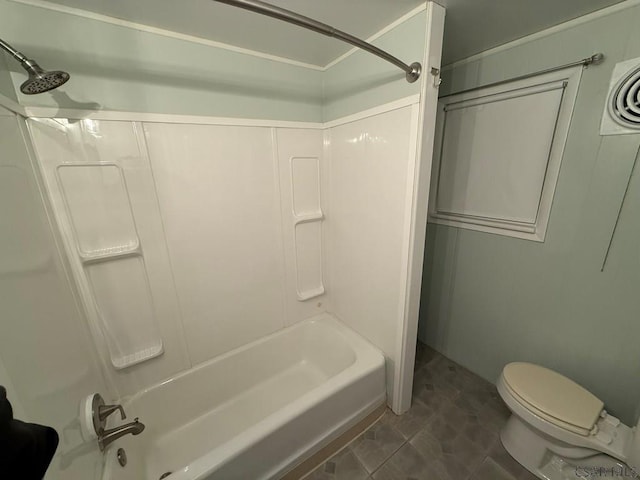 bathroom featuring toilet and bathtub / shower combination