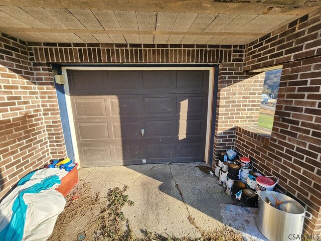 doorway to property featuring a garage