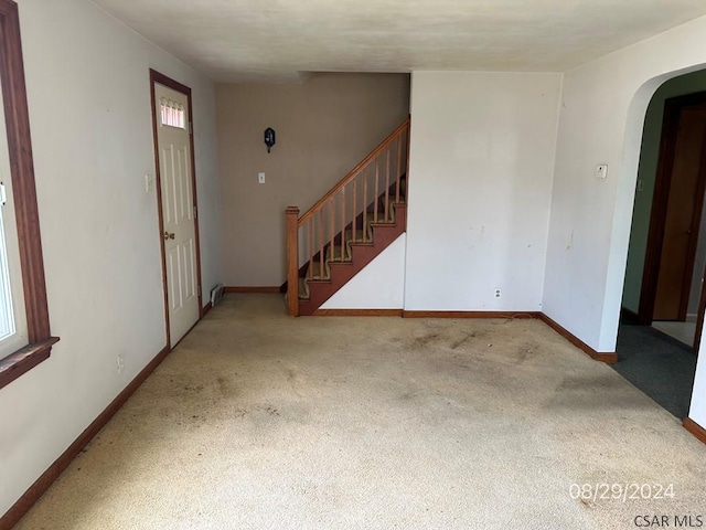 spare room featuring a wealth of natural light