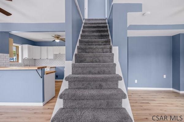 3445 Graham Ave, Windber, PA 15963 - stairs featuring ceiling fan and wood finished floors