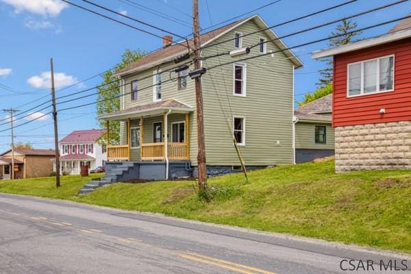 3445 Graham Ave, Windber, PA 15963 - view of front of home with a front lawn and a porch