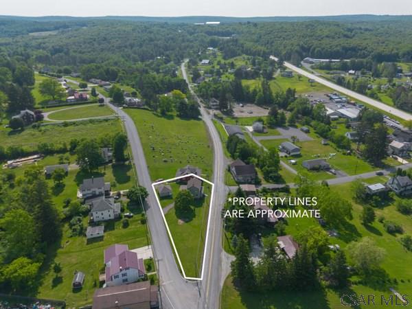 3445 Graham Ave, Windber, PA 15963 - aerial overview of property's location with a heavily wooded area and property boundaries highlighted