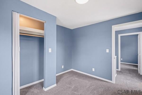 3445 Graham Ave, Windber, PA 15963 - unfurnished bedroom featuring carpet flooring and a closet