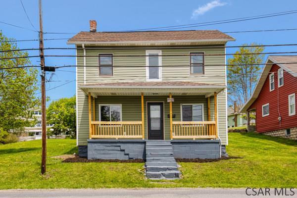 3445 Graham Ave, Windber, PA 15963 - view of front facade featuring a porch and a front yard