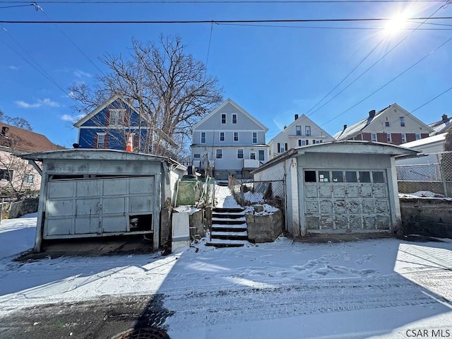 view of snow covered garage