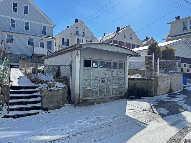 view of snow covered garage